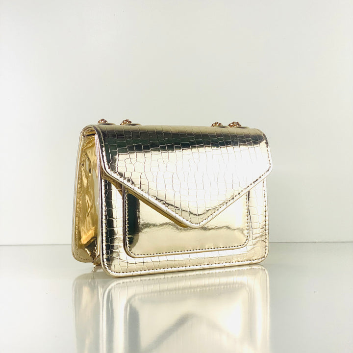 Golden cross body bags