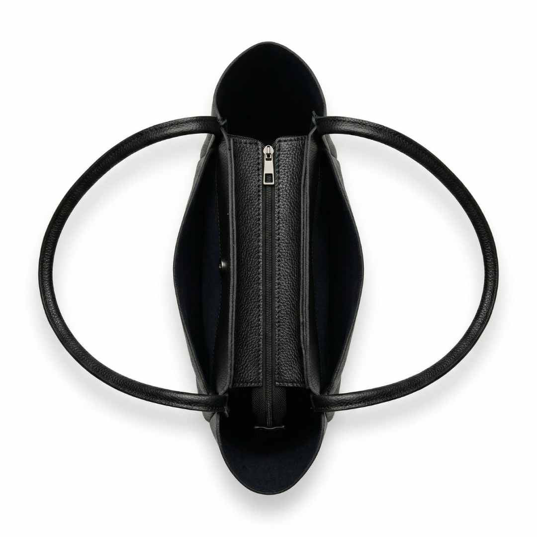 Black shoe with circular design on a white background